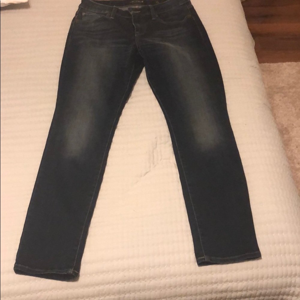 A brand new pair of luck brand dark wash jeans